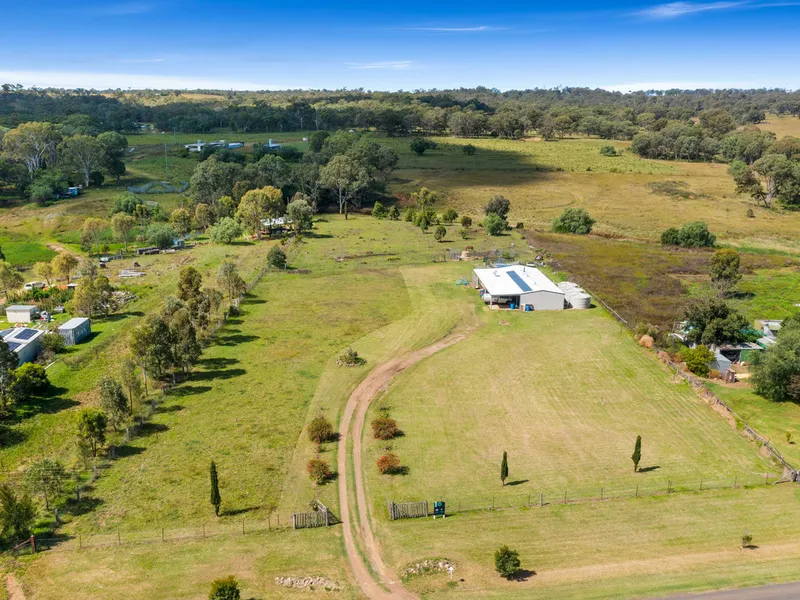 3 Acres with Shed House & Creek Frontage!