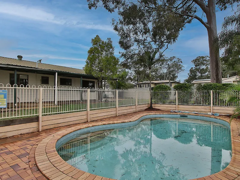 In-ground pool plus Landscaped Gardens 