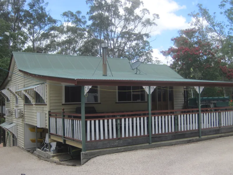 Sunshine Coast hinterland Queenslander on acreage. Self contained flat under. Separate granny flat, Rumpus. Hobby farm, share property with income.