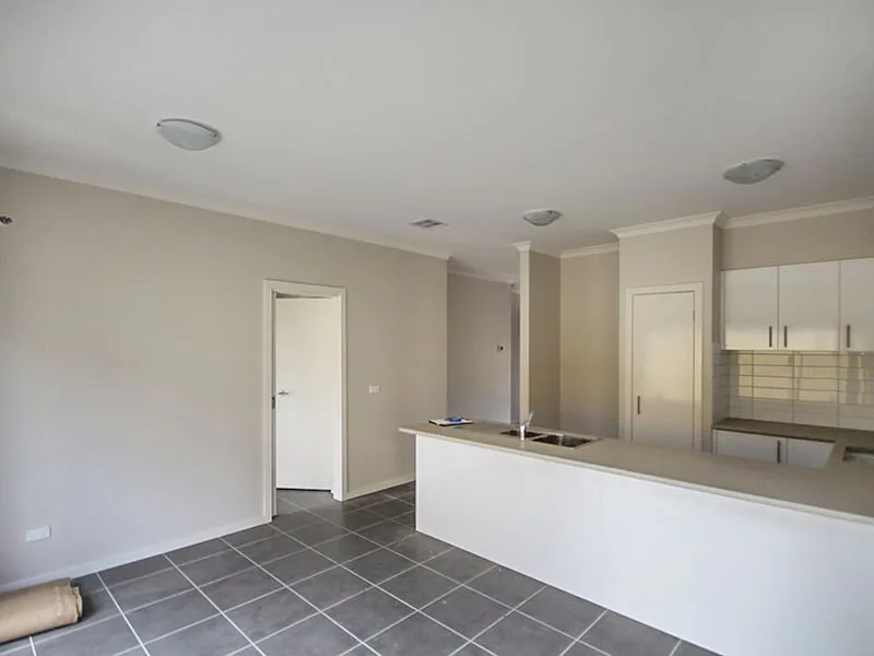 Modern Three Bedroom Townhouse, Sure To Impress!!