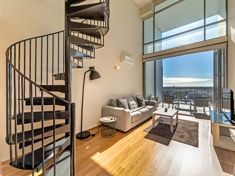 SUN-DRENCHED SPLIT LEVEL APARTMENT