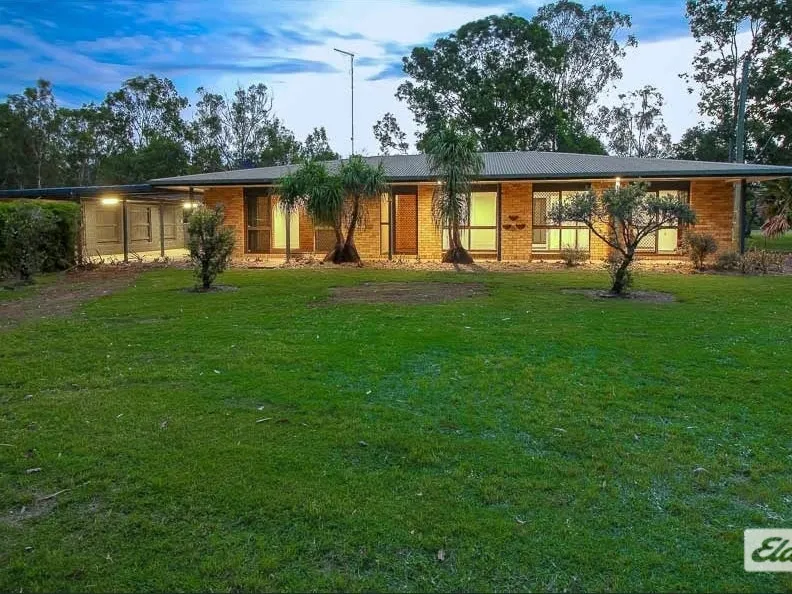 Beautiful Low Set Brick Home on 8 ACRES