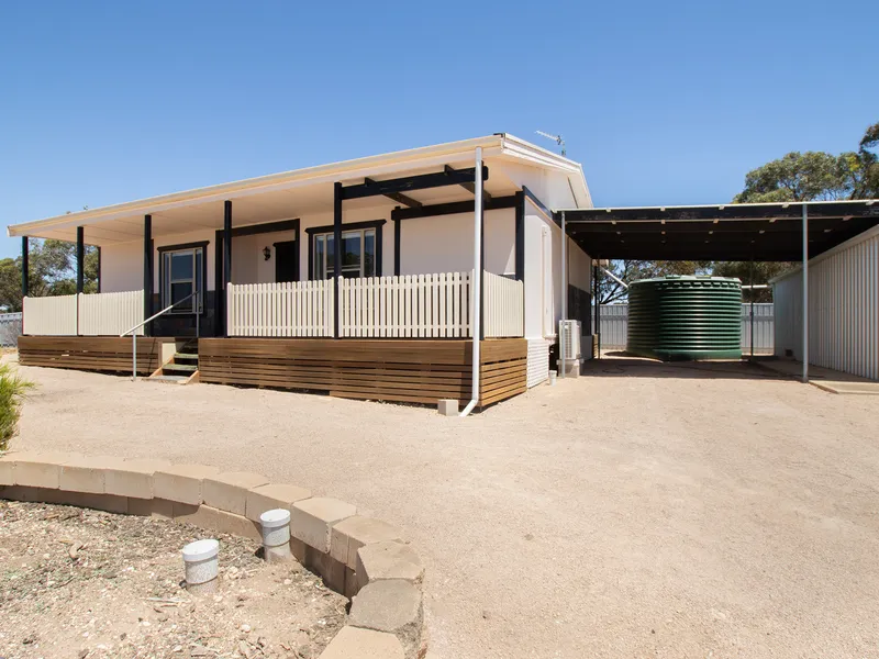 SHED FOR THE BOAT AND CARAVAN AND AN INCOME TO GO WITH IT