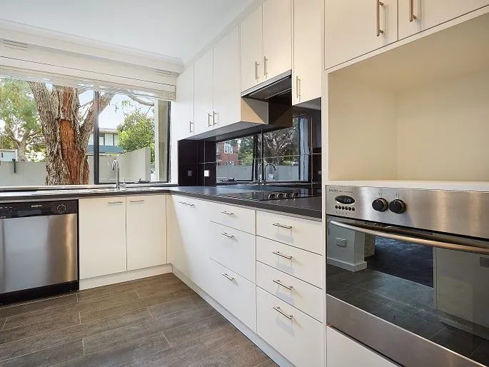 THIS FULLY RENOVATED NORTH FACING APARTMENT COULD BE YOURS