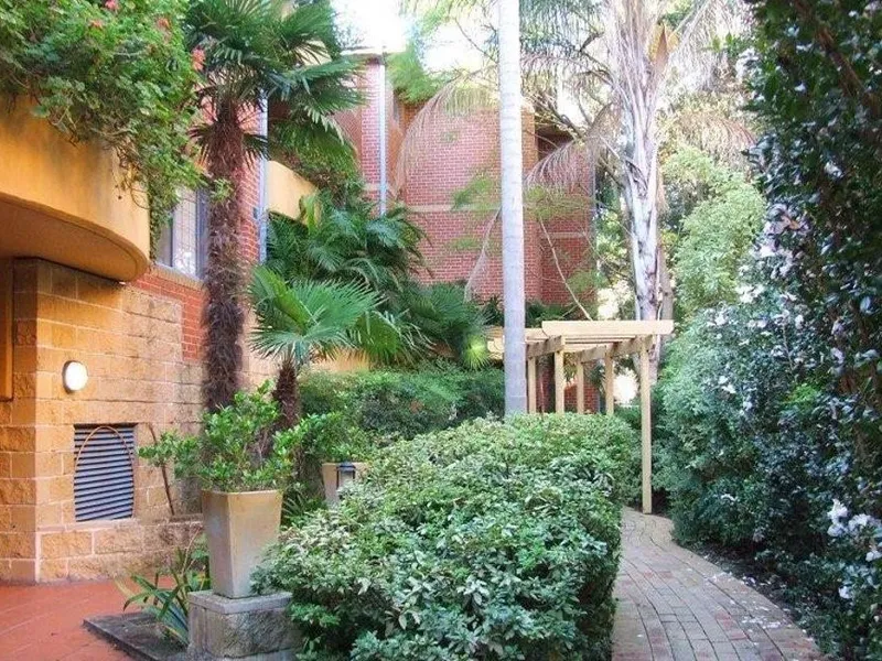 THE GENEROUS APARTMENT WILL APPEAL TO ALL