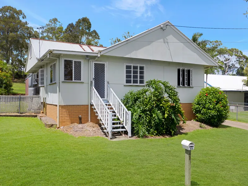 SPACIOUS HOME ON HUGE BLOCK.....