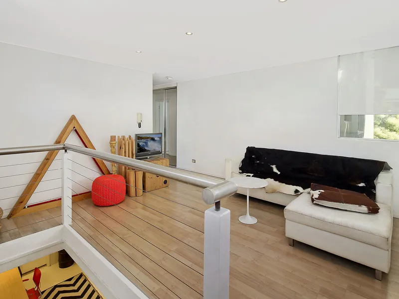 A rare find - a dual level studio with parking