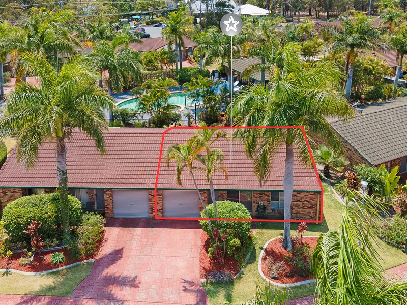 Modern Single Level Villa With A Perfect Elevated Northerly Aspect Overlooking A Peaceful Landscaped Pool