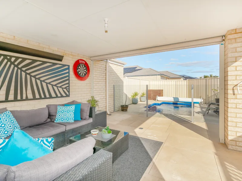 Low maintenance modern living + a pool.