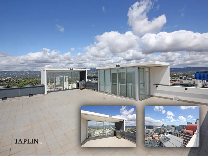 Exceptional ultra-spacious rooftop penthouse - with Amazing Panoramic City and Adelaide Hills views.