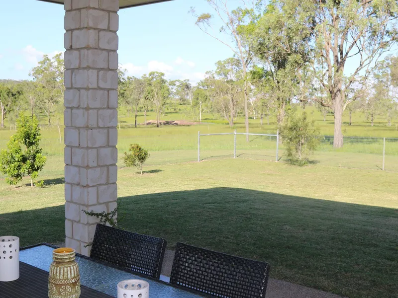 Ideallic Acreage Setting and Top Quality Home to Boot!