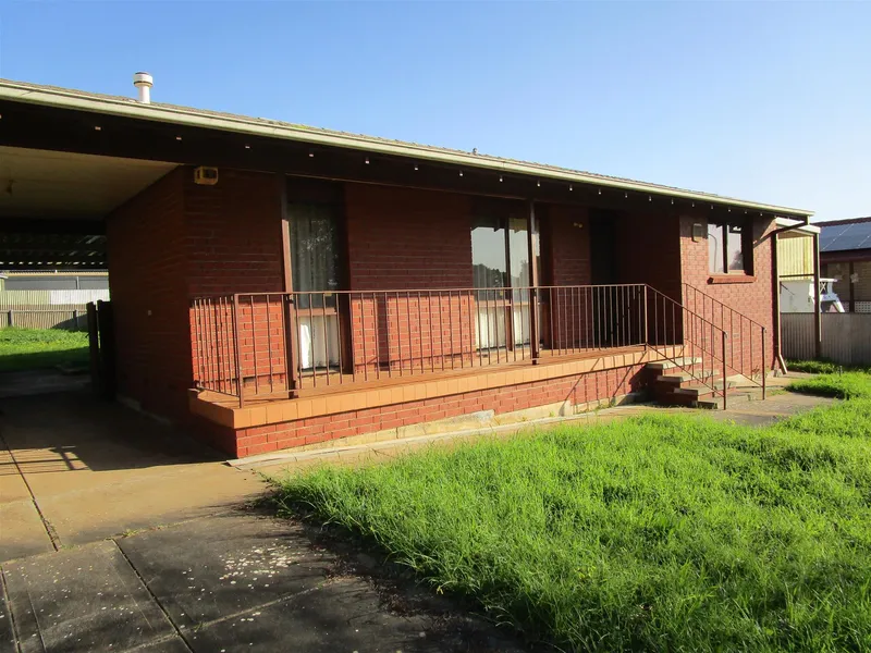 Lovely home with Carport - Large garage with cement floor Plus fully fenced with good security