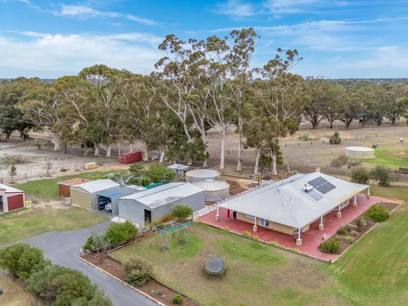 Meticulously Renovated Modern Acreage Oasis