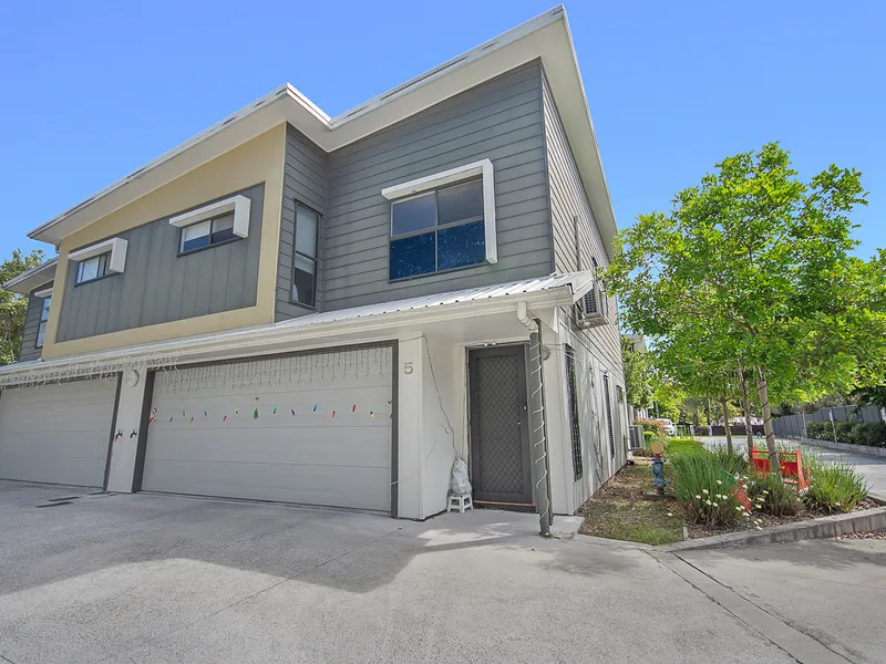 Four-bedroom townhouse situated in a prime location, just six years young.