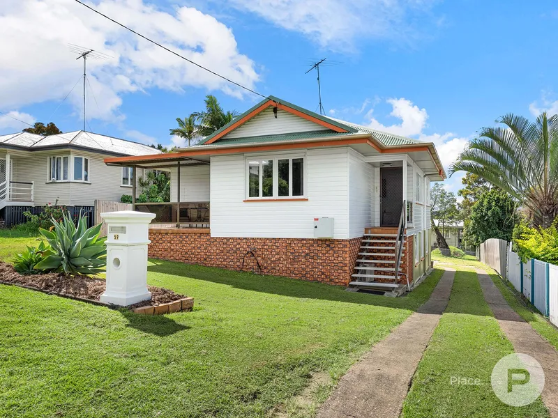 Renovated two-bedroom home with workshop, full of potential