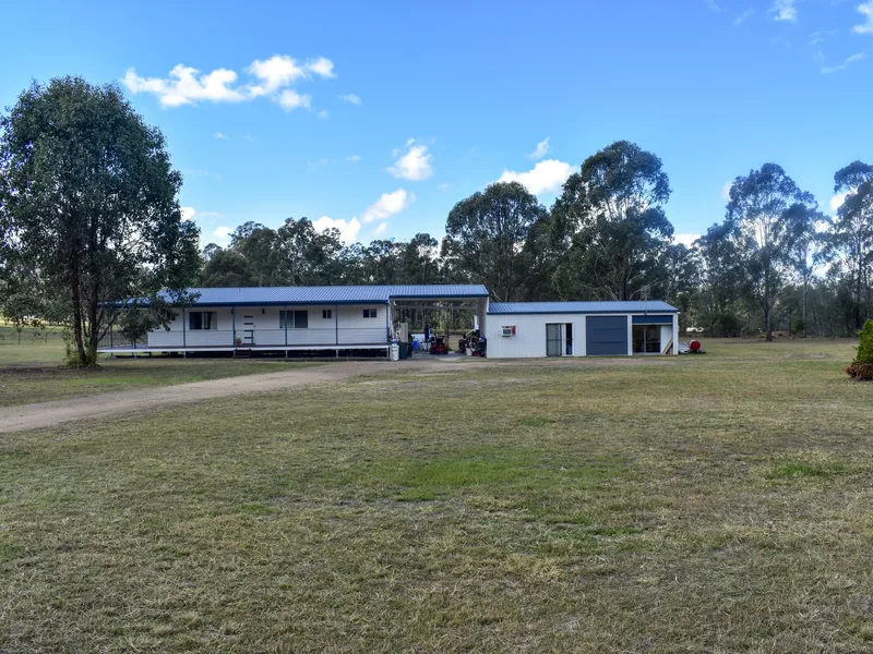 3 bdrm home on acerage with a 2 bdrm flat and studio