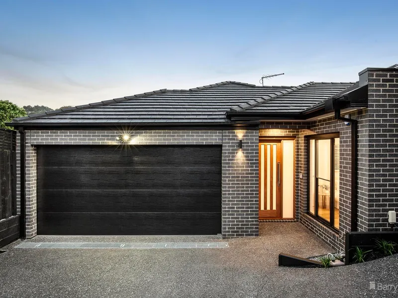 Brand new luxury living in a prized dual school zone.