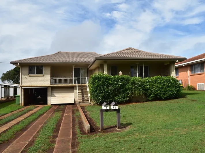 Nestled In A Peaceful Tree Lined Street!