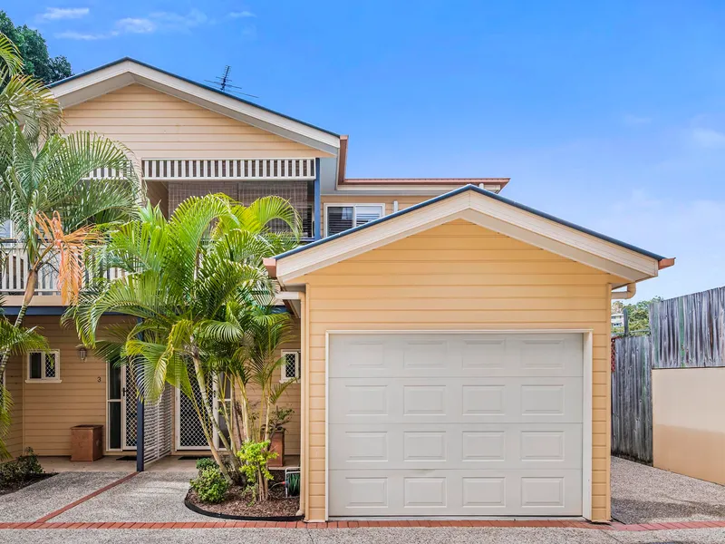 Beautiful three-bedroom townhome offering low-maintenance lifestyle