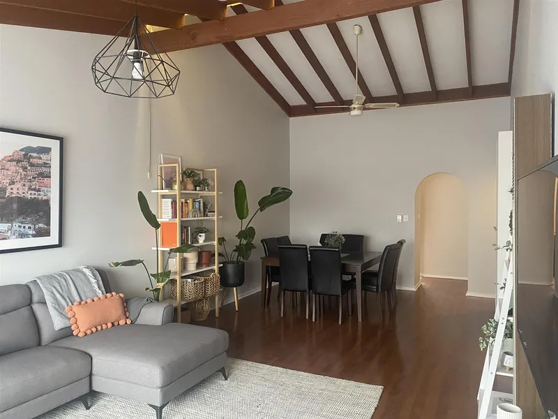 Generously Sized 2 Bedroom Homette With Private Front and Rear Courtyard & Parking - A Must See!