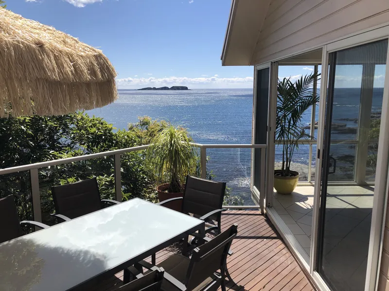 Perched clifftop living with uninterrupted ocean views.