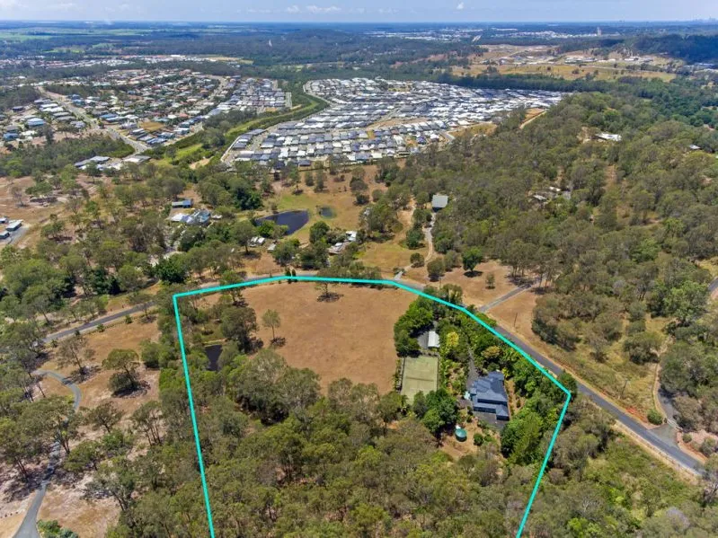 Ormeau Hills 8.4 acres. Close to M1. One of the best. Must do inspection!!