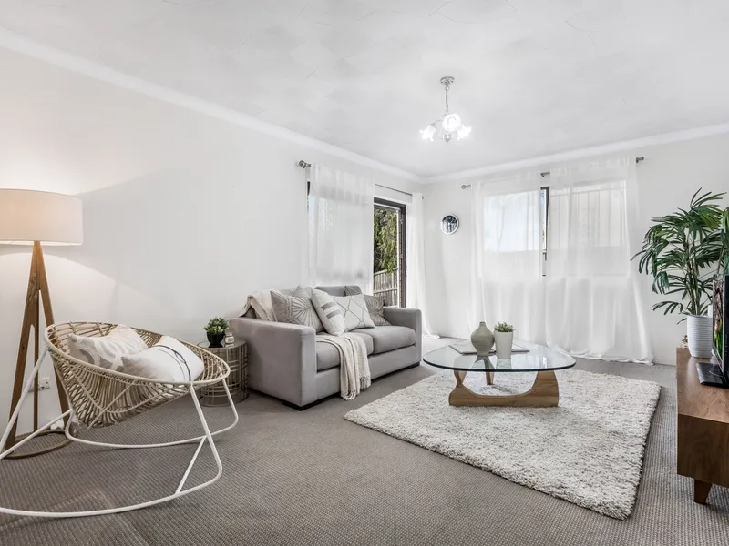 Spacious Ground Floor Unit Within Walking Distance to Everything