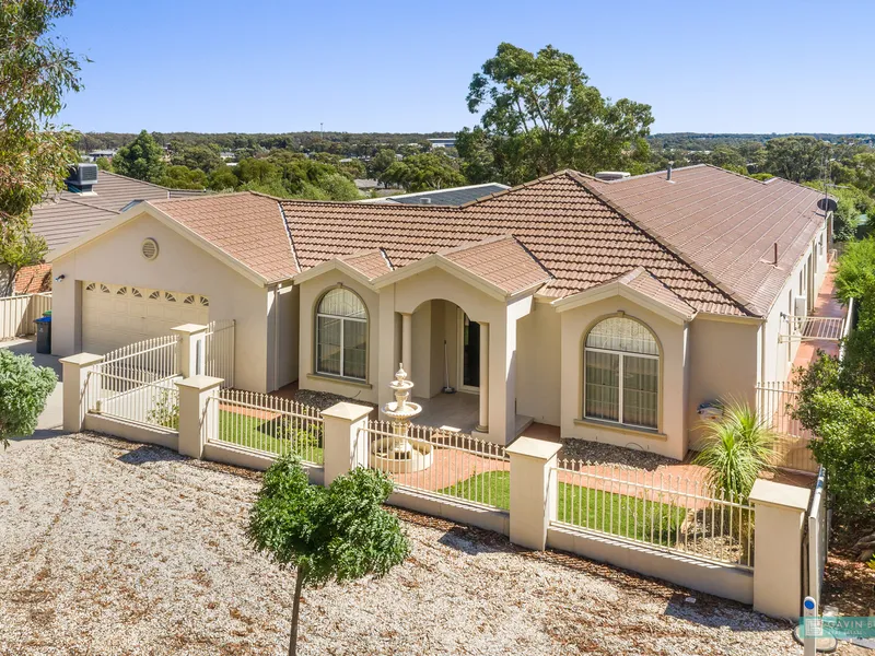 Classy and desirable family home with indoor heated pool - a real entertainer!