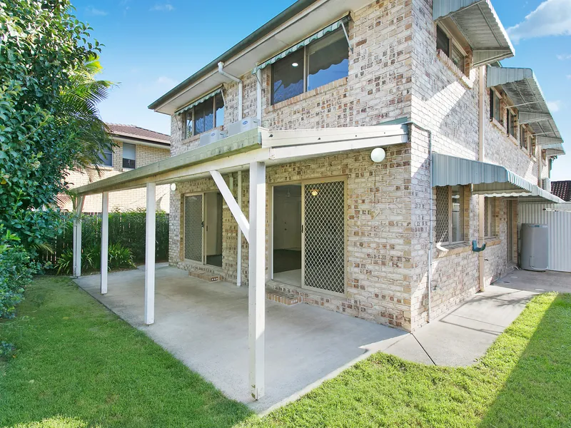 Enjoy easy living in highly sought after Palm Beach 