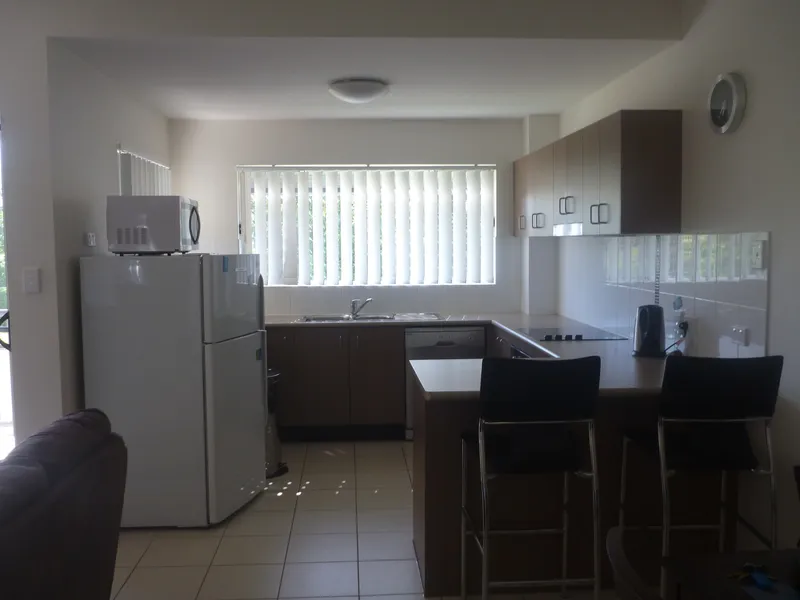 MODERN FULLY FURNISHED UNIT IN GATED COMPLEX