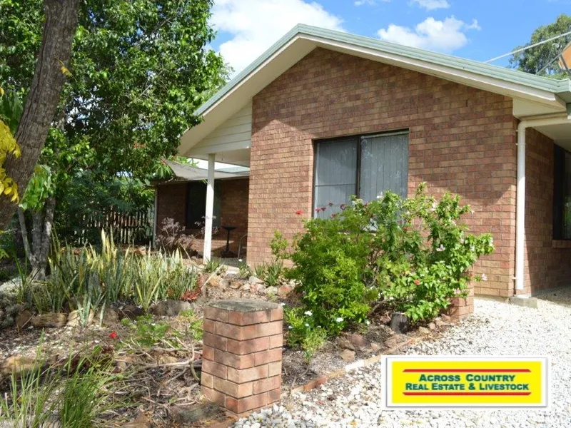 A Private Three Bedroom Brick Home Just Minutes From The Local School