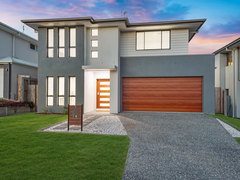 QUALITY BUILT FAMILY HOME IN COOMERA FORESHORE