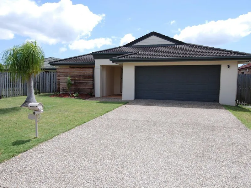 Home in a quiet cul-de-sac, huge covered outdoor entertaining area leading on to a large flat backyard.