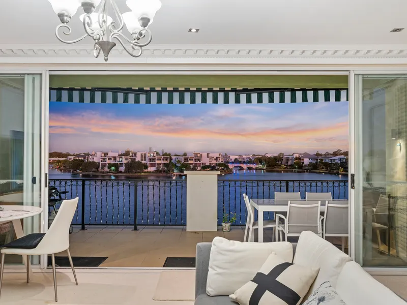 Experience the charm of Tuscany combined with serene lakefront living in this stunning property at Emerald Lakes.