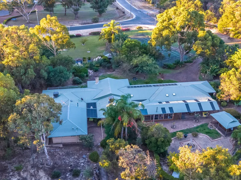 ESCAPE TO A TRANQUIL ACREAGE LIFESTYLE