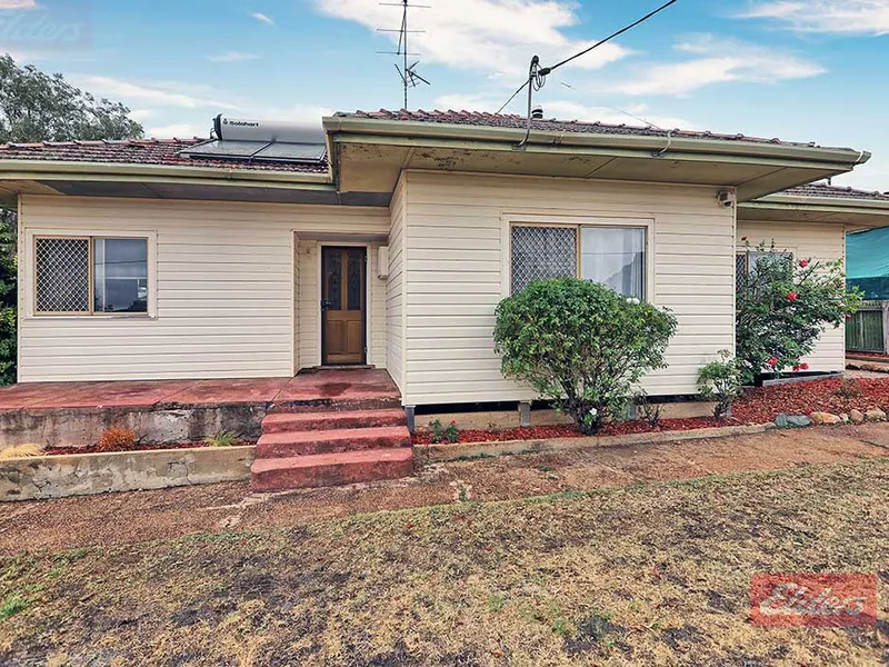 Great home on huge block.