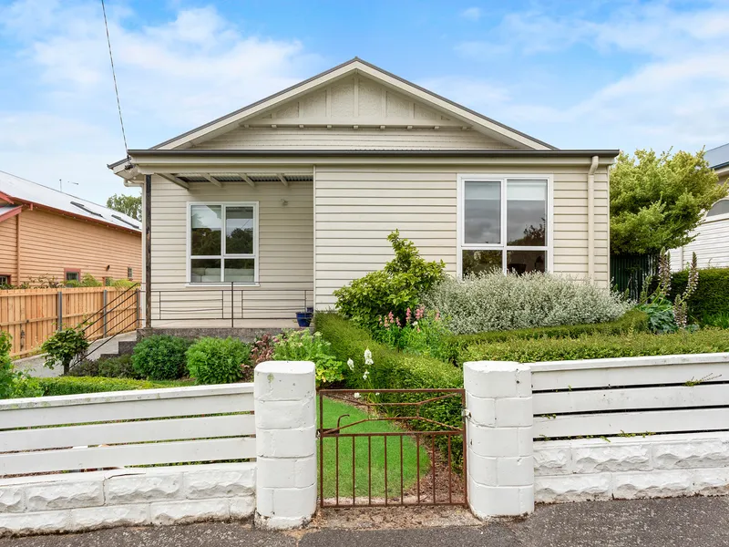 Renovated character home, multiple living rooms, established garden with side access