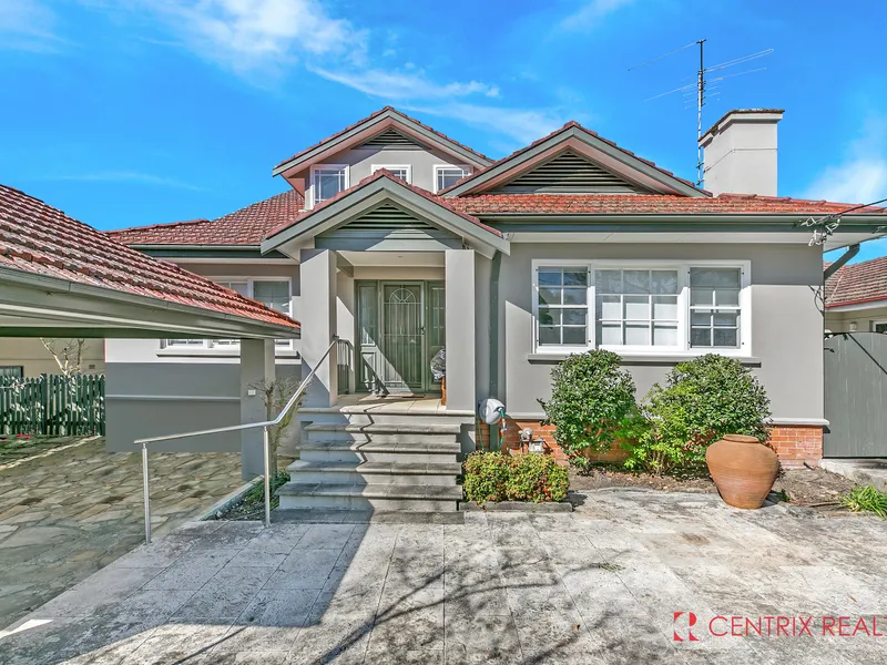 Beautifully Presented 5 Bedroom Home Located on Quiet Tree-lined Street