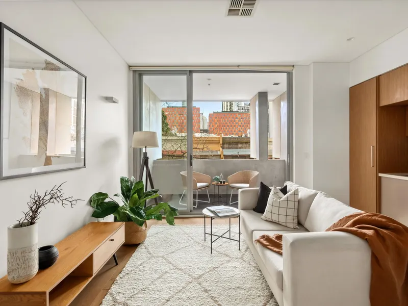 Stylish modern studio with north facing balcony in prime locale