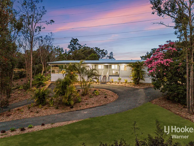 PRIVATE ACREAGE WITH STYLISH CONTEMPORARY COMFORT