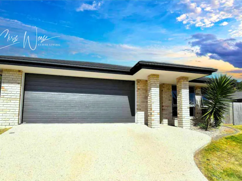 LOW-SET BRICK WITH SIDE ACCESS