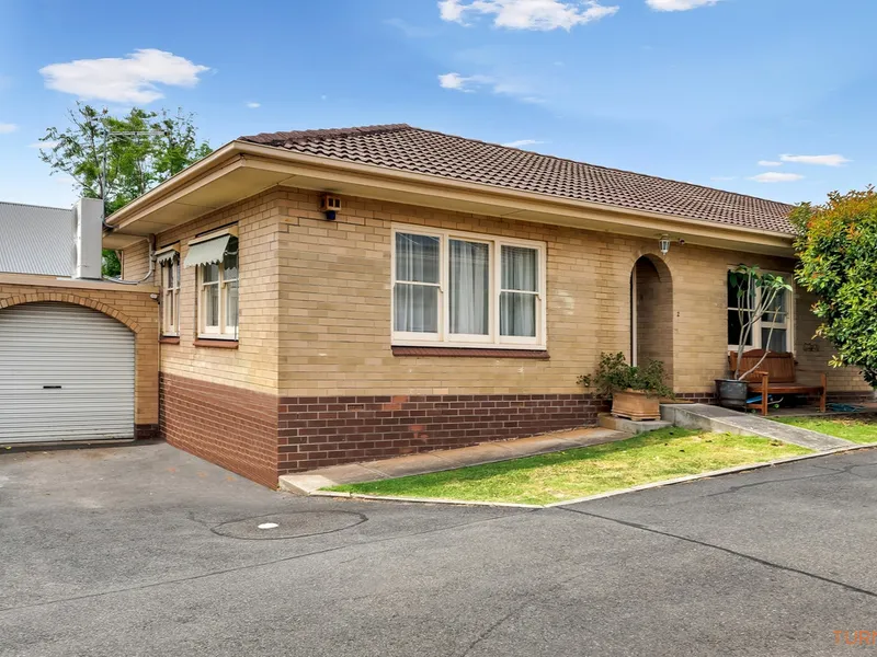 Charming low-maintenance unit in highly sought-after locale!