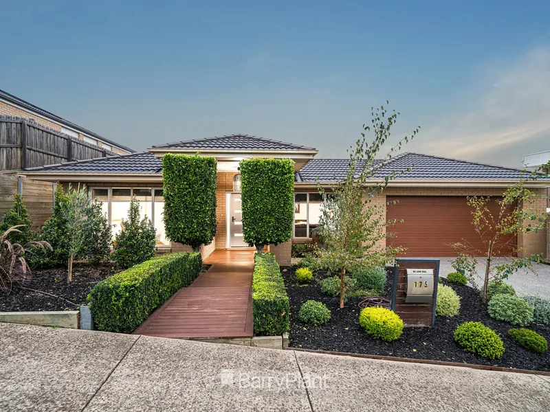 Meticulous home with large flat backyard.