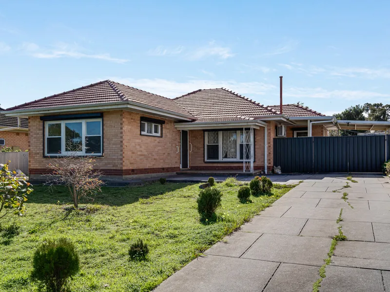 Timeless 1960s Home with Modern Comforts and Generous Outdoor Space
