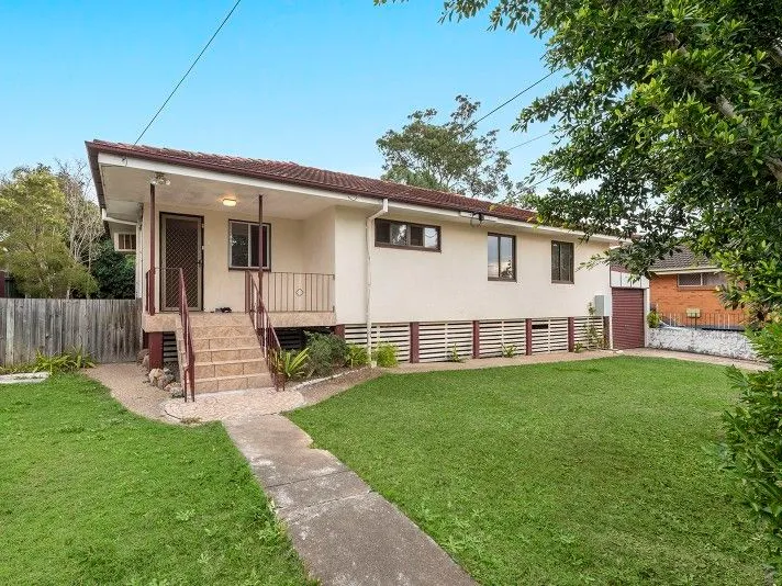Simple but Elegant - Three Bedroom Mid Set Brick Home!