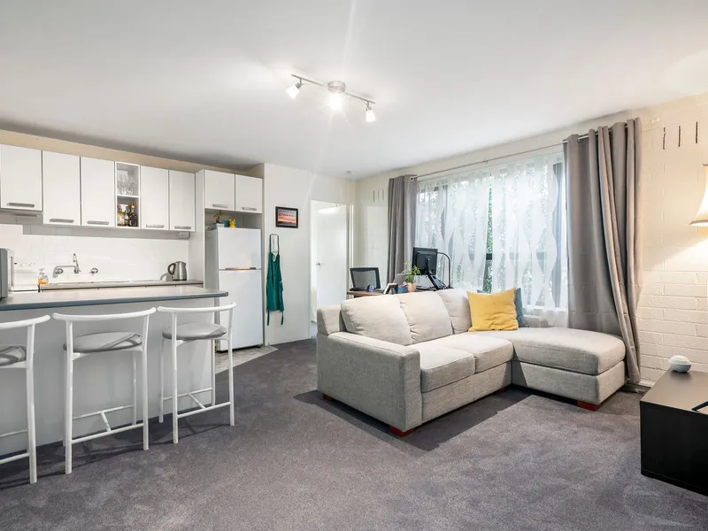 Low maintenance living meets Enviable Locale.