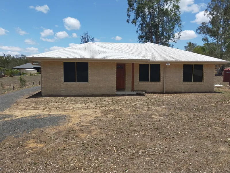 LOOKING FOR A BRICK HOME WITH A BIG SHED?