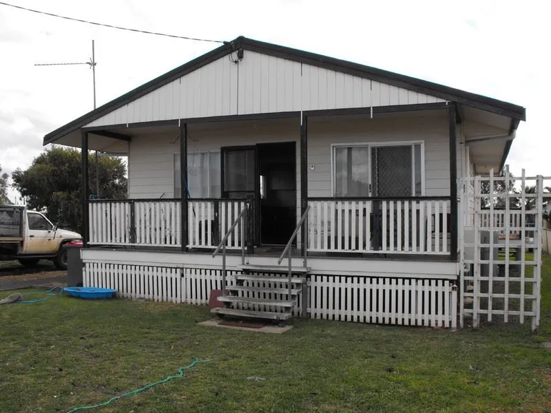 Neat 3 bedroom home with shed on a quarter acre.