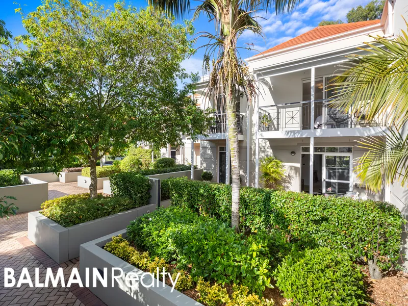 North Facing Townhouse with Two Oversized Garden Courtyards & Double Lock-Up Garage in the Resort Like 'Balmain Cove' Waterfront Complex