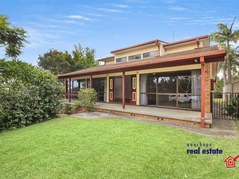 Elevated family home on large block